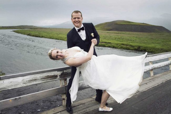 Married dancing on a bridge in Iceland